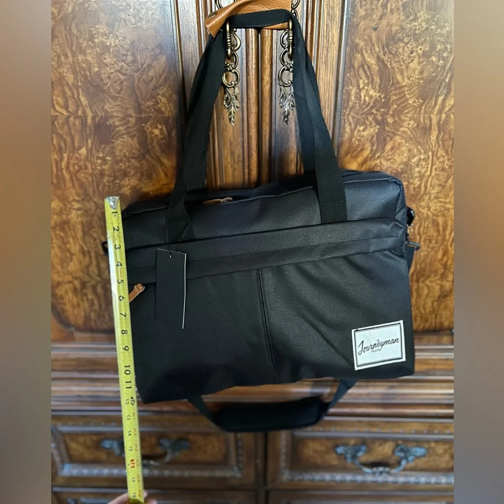 NWT The Journeyman Bag Co Duffle Bag in black with red mesh interior.